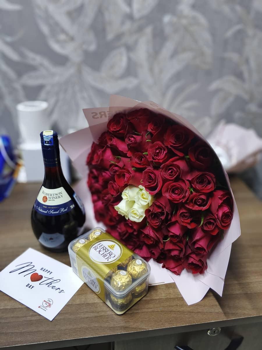 Golden Celebration Gift Hamper – Luxury Flowers, Wine & Ferrero Rocher T16 with Personalized Card - Image 1